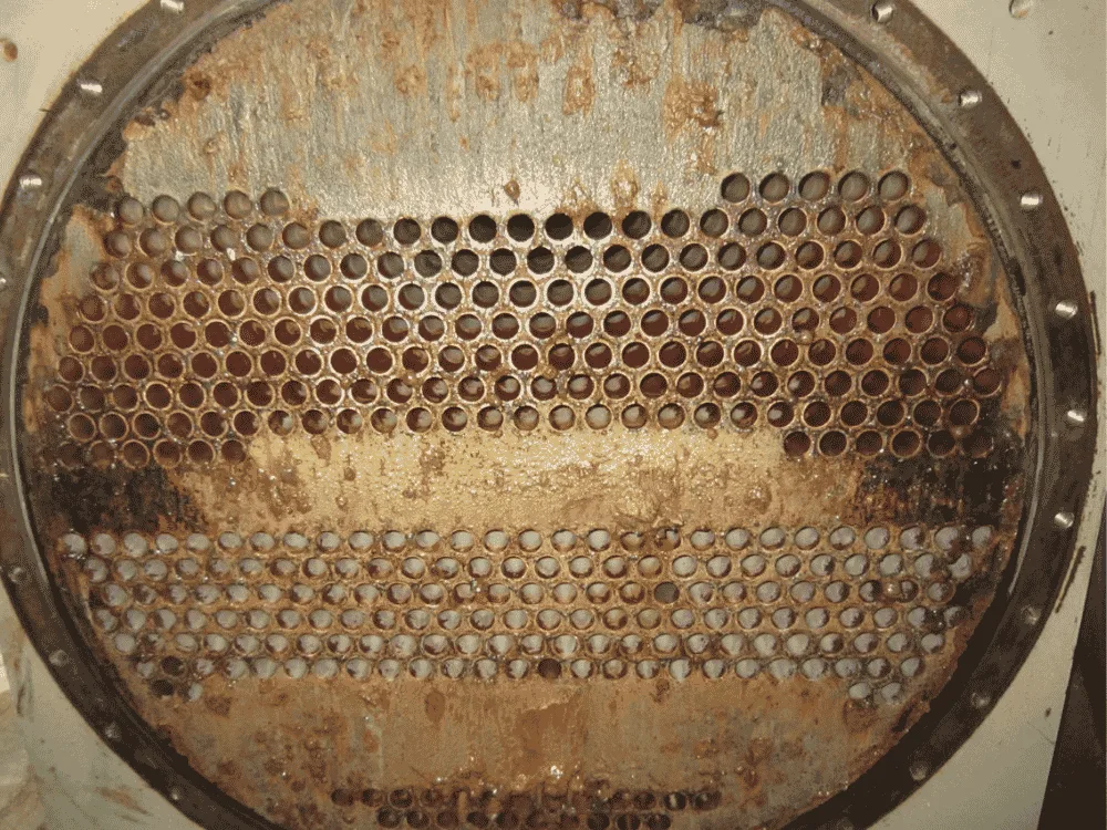 Hong Kong shopping mall cooling tower condenser before QEQI® — scale-fouled tubes