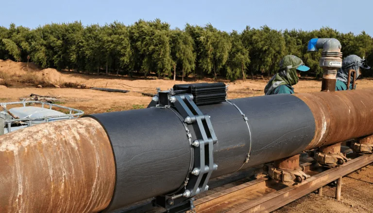 QEQI® industrial unit installed on a large irrigation pipe at an olive grove in Saudi Arabia