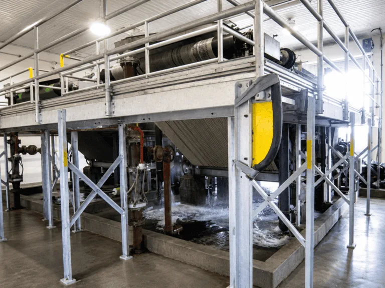 Belt filter press at the City of Walla Walla wastewater treatment plant, QEQI® struvite scale prevention case study