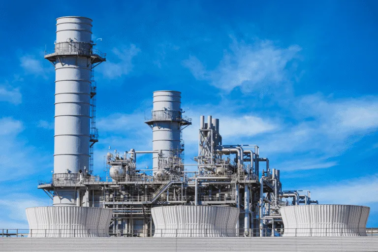 Combined cycle power plant with stacks and cooling towers, QEQI® cooling tower inhibitor reduction case study, Great Lakes USA